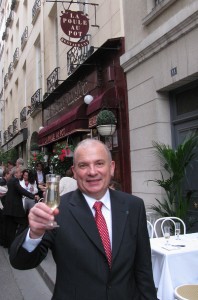 Paul Racat raises a glass to traditional bistro fare at La Poule au Pot. Photo GLK.