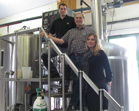 By the vats at Ardwen (from the top down) Geoffrey Stevenin, brewmaster, Daniel Guerin, founder, Mélanie Grégoire, director. Photo GLK.