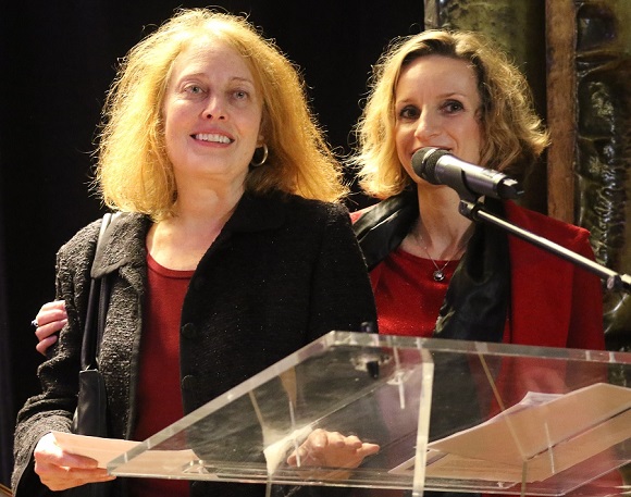 Corinne LaBalme receiving her foreign press award in Paris, Dec. 14, 2015, while being congratulated by Hungarian journalist Katelin Venczel. Photo Henri Martin
