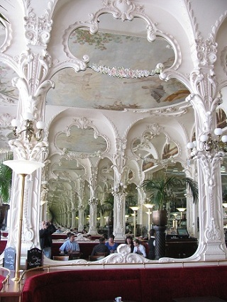 Echo of mirrors in Moulin's Art Nouveau Grand Cafe. Photo GLK.