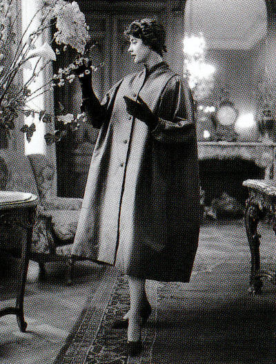 Dior model posing in the Hotel Plaza-Athenée, 1949.