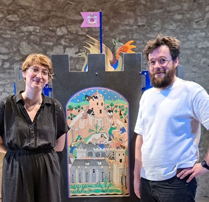Héllène Gaulier and Gwenolé Gasiner, of Agence GG, with their theatrical board in the medieval keep at La Roche-Guyon. Photo © GLK.