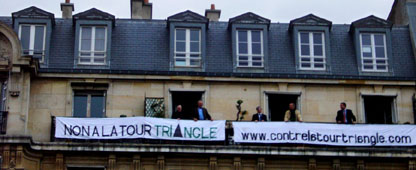 Banners in opposition to the Triangle Tower.